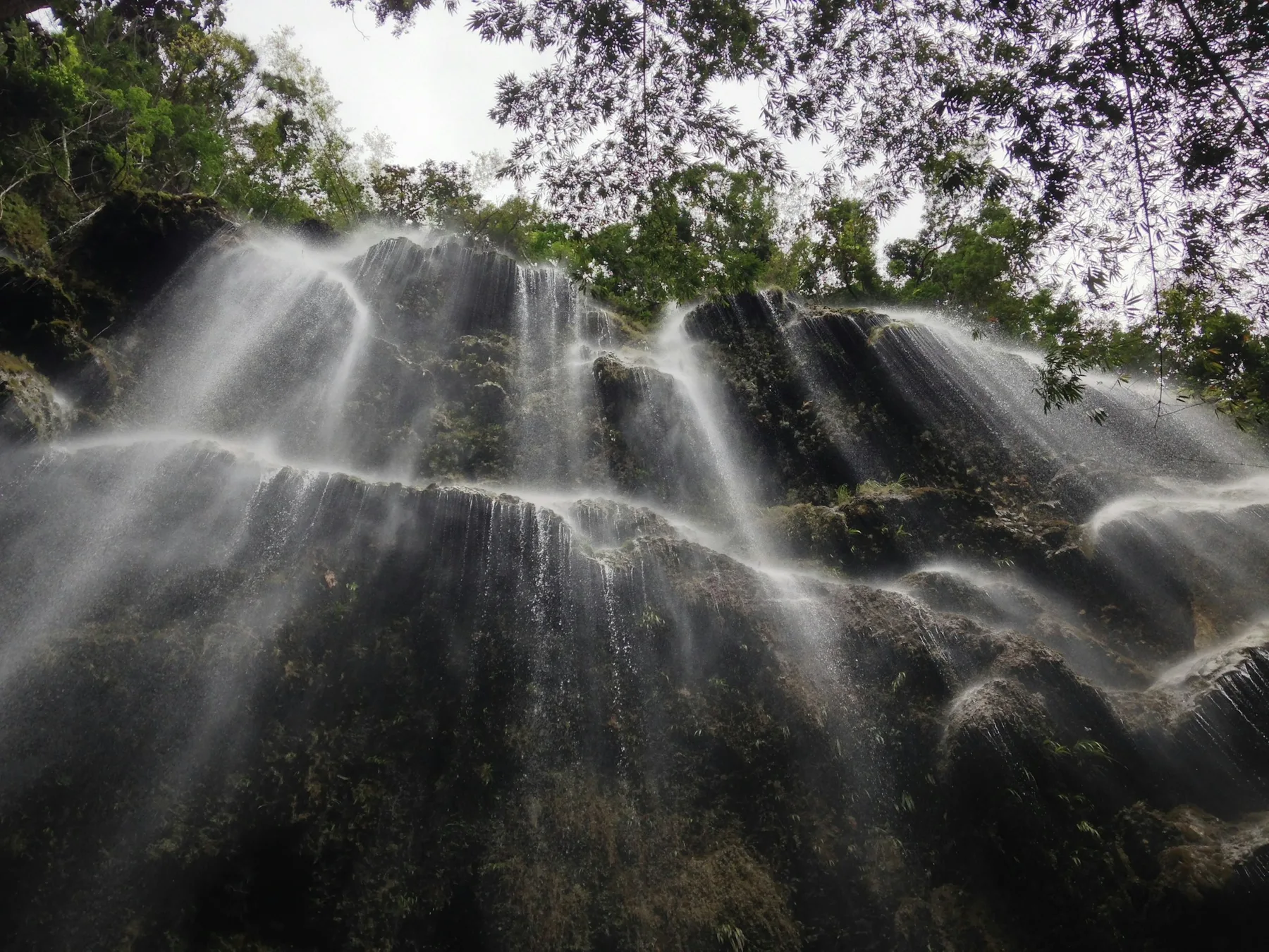 Water cascading over the rock face at Tumalog Falls